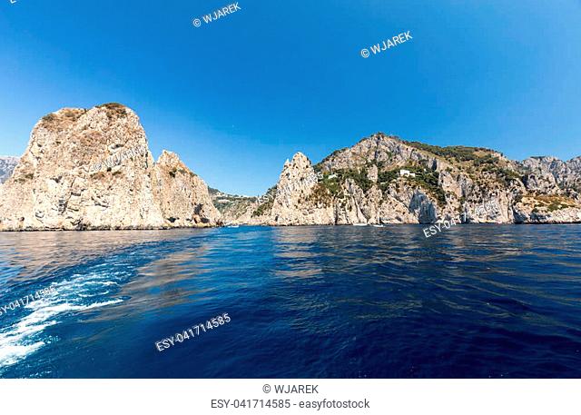 View from the boat on the cliff coast of Capri Island, Italy
