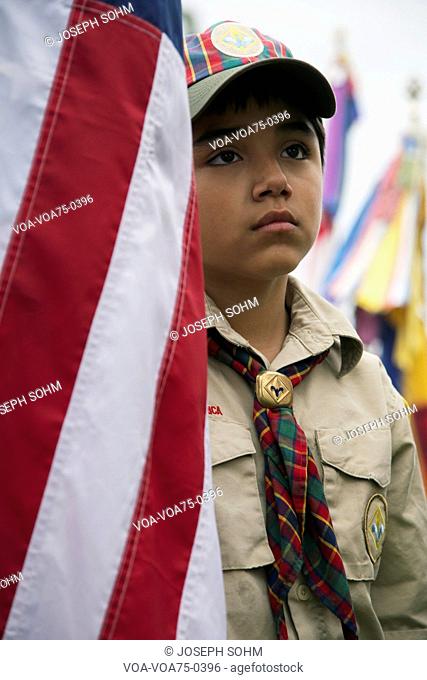 Boyscouts display US Flag at solemn 2014 Memorial Day Event, Los Angeles National Cemetery, California, USA