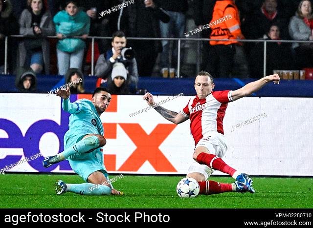 Barcelona's Ferran Torres and Antwerp's Ritchie De Laet pictured in action during a game between Belgian soccer team Royal Antwerp FC and Spanish club FC...