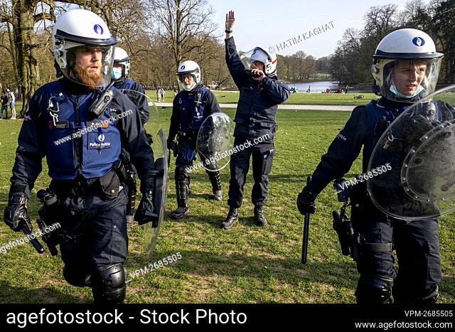 Illustration picture shows police in protective gear in action at the Bois de La Cambre - Ter Kamerenbos, in Brussels, Thursday 01 April 2021