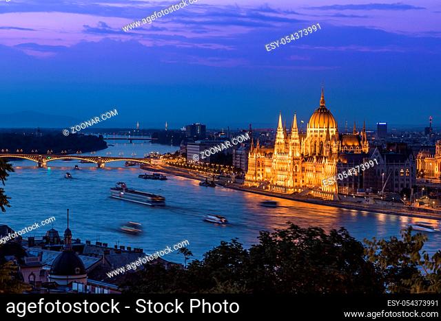 River view of Budapest at evening, illuminated Chain Bridge and Parliament Building