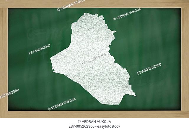 outline map of iraq on blackboard