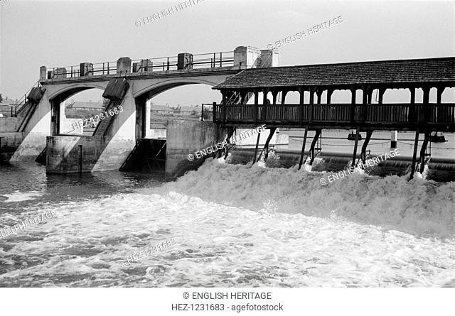 Teddington Weir, Richmond, London, c1945-c1965. Teddington Weir was first built in 1811 to improve navigation on the River Thames