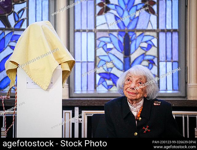 23 January 2023, Berlin: Margot Friedländer, Holocaust survivor, sits next to a shrouded bust that Friedländer will display after receiving the Federal Cross of...