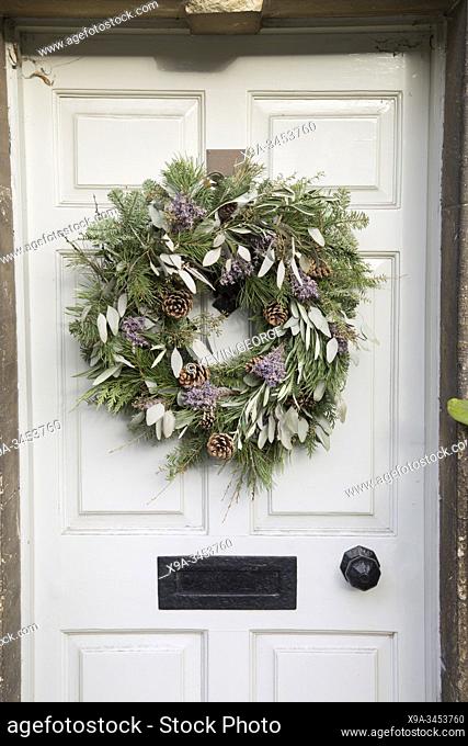 Green Leaves and Fir Cones on Christmas Wreath