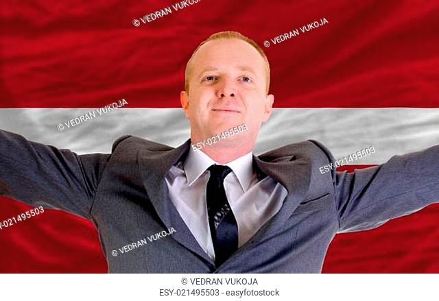 happy businessman because of profitable investment in latvia sta