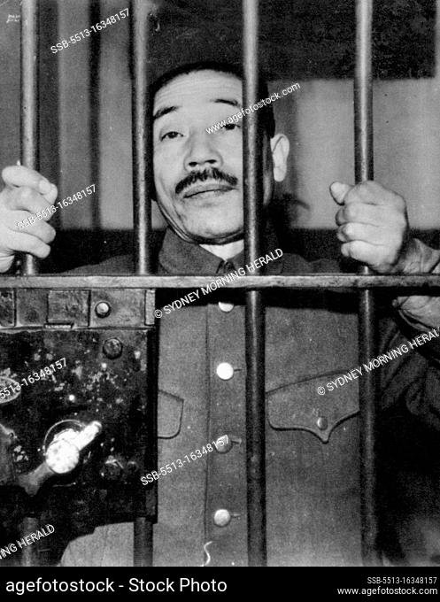 From Behind Prison bars in Shanghai, Captain Sotojiro Tatsuda awaits his trial as a war criminal. Tatsuda was identified by an American airman as the commanding...