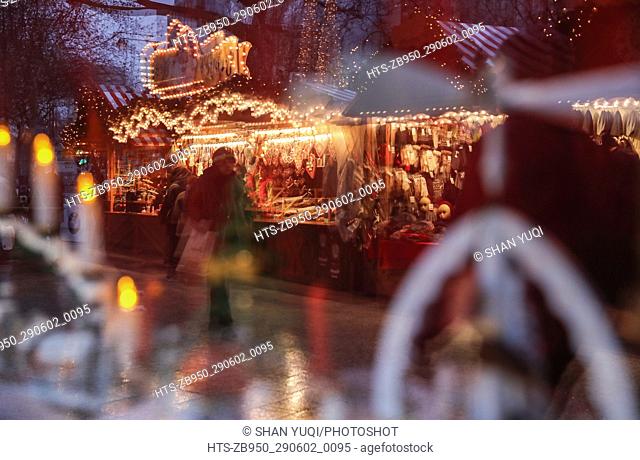 (161222) -- BERLIN, Dec. 22, 2016 () -- People walk around in the reopened Christmas market at the Breitscheid Square in Berlin, capital of Germany, on Dec