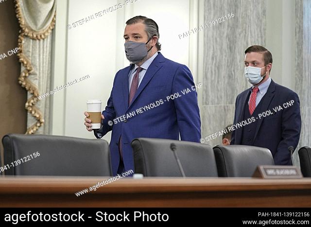 United States Senator Ted Cruz (Republican of Texas), wears a protective mask while arriving to a Senate Commerce, Science and Transportation Committee...