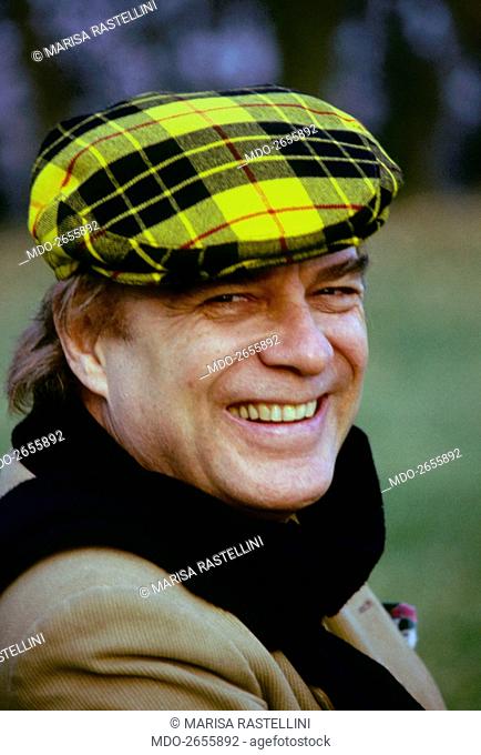 Italian actor and director Giorgio Albertazzi smiling. 1980s