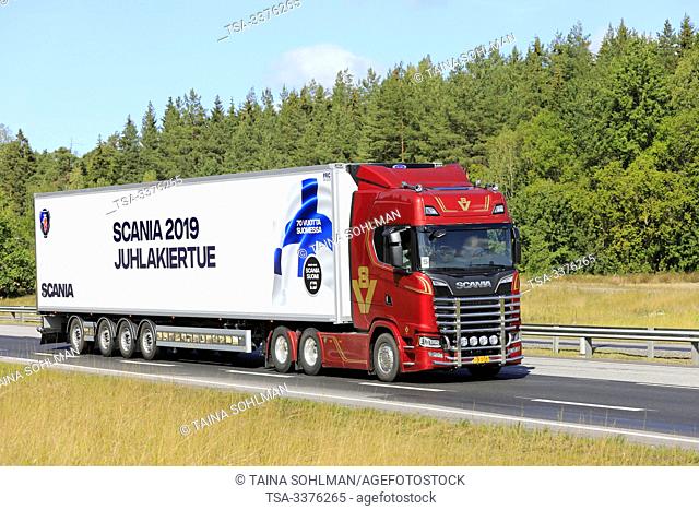 Turku, Finland. August 24, 2019. Next Generation Scania S650 V8 50 years anniversary truck pulls semi trailer on road. Scania in Finland 70 years tour