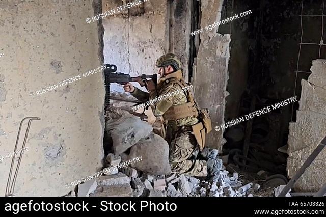 DECEMBER 13, 2023: A serviceman provides fire support to a reconnaissance unit of the Southern Group of Forces by suppressing Ukrainian fire nests in the ruins...