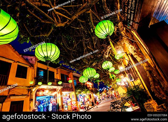 HOI AN, VIETNAM - SEPTEMBER 22, 2018: Traditional buildings at night with lanterns in the UNESCO heritage town of Hoi An in the Quang Nam Province of Vietnam