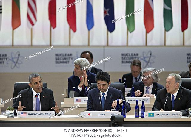 United States President Barack Obama, left, speaks as Shinzo Abe, Japan's prime minister, center, and Nursultan Nazarbayev, Kazakhstan's president