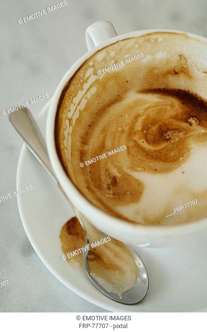 Half-full Cappuccino cup