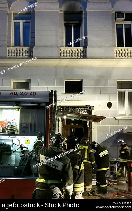 RUSSIA, MOSCOW - MAY 25, 2023: Firefighters at the scene of a fire in a residential building in Nikitsky Boulevard. According to emergency services