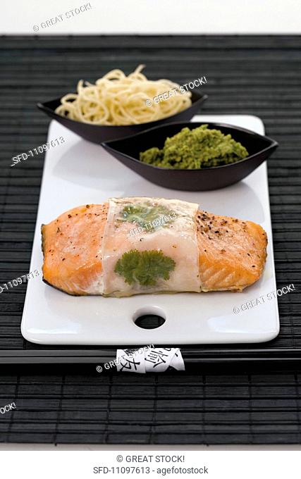 Salmon fillet wrapped in rice paper with Asian pesto