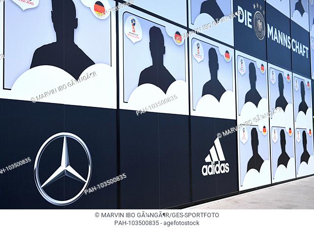The Mercedes logo in front of the wall of empty player images in front of the German Football Museum. GES / Fussball / WM 2018: Squad nomination of the DFB for...