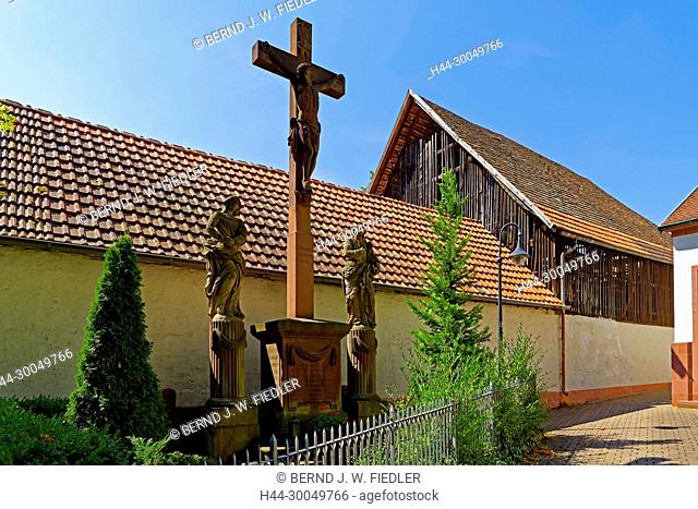Parochial garden, cross, stone figures, home Herx Germany