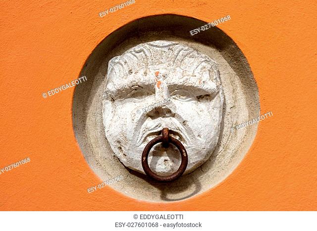 Old wall head decoration in Potenza. Basilicata. Italy