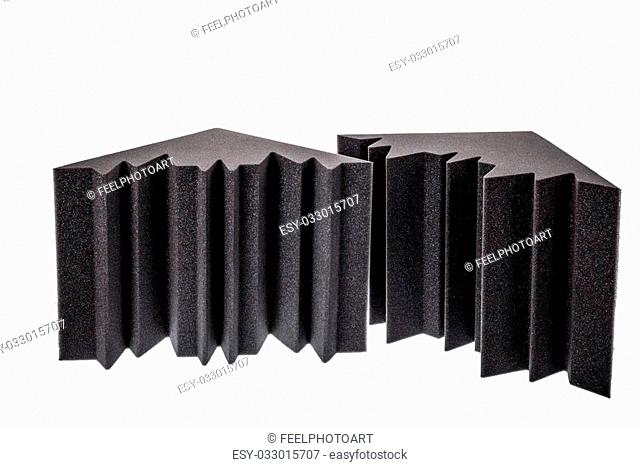 two pieces of microfiber foam insulation for noise in the corners of the music studio or acoustic halls , rooms or houses