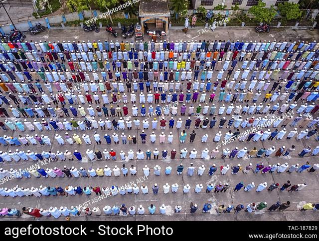 BARISHAL, BANGLADESH - AUGUST 6: Aerial view take with a drone, shows People attend a Muslim Funeral of a person who lost the battle against Covid-19 disease