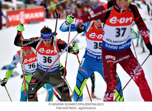 Andreas Birnbacher of Germany (2-L) during the men's 20km individual competition at the Biathlon World Championships, in the Holmenkollen Ski Arena, Oslo