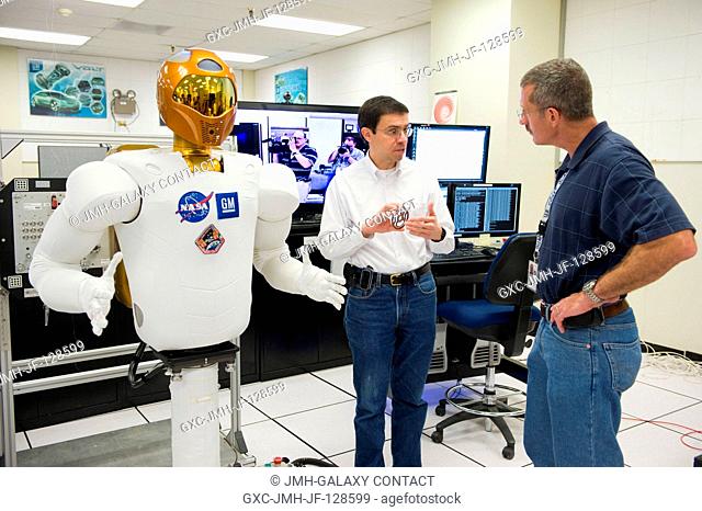 NASA astronaut Dan Burbank (right), Expedition 29 flight engineer and Expedition 30 commander, participates in a Robonaut familiarization training session in...