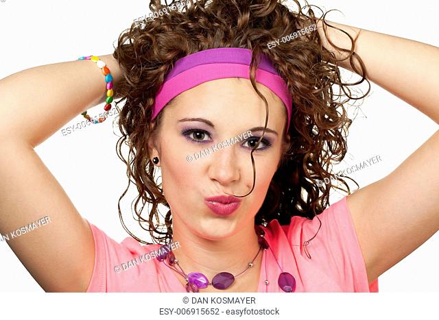 Girl in neon 80's colors plays with hair. Makeup by Irene Prowell - professional freelance makeup artist