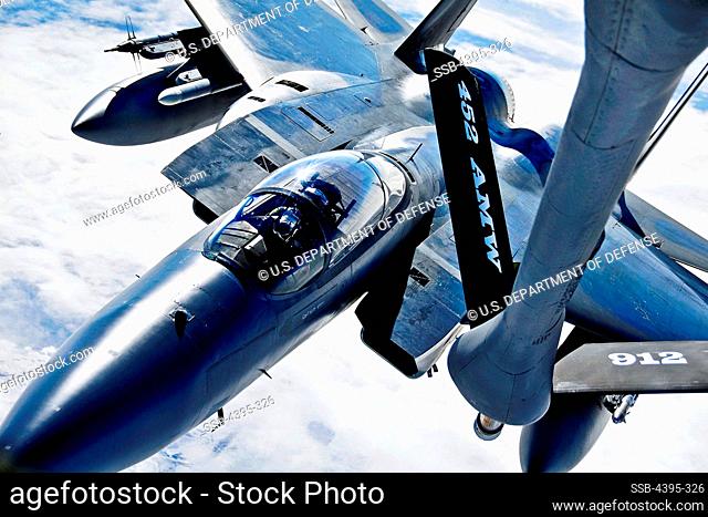 A KC-135 Stratotanker provides aerial refueling to an F-15 Eagle over the Joint Pacific Alaska Range Complex during RED FLAG-Alaska 11-1, April 28, 2011