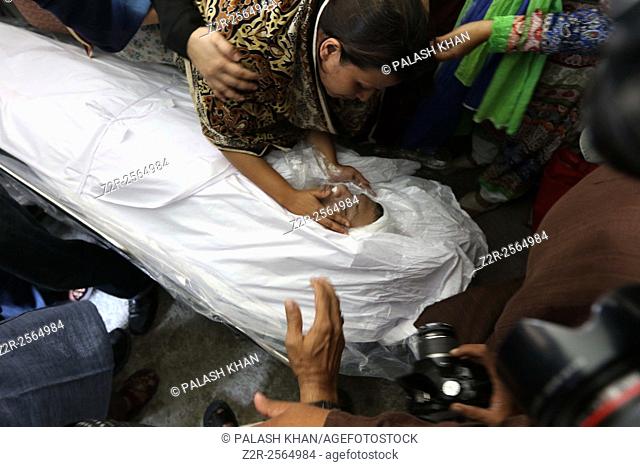 BANGLADESH, Dhaka : The wife of publisher Faisal Arefin Dipan, who was hacked to death, reacts next to his body in Dhaka on November 1, 2015