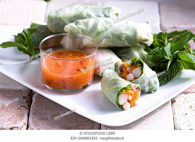 Rice paper rolls filled with salad, surimi and prawns China