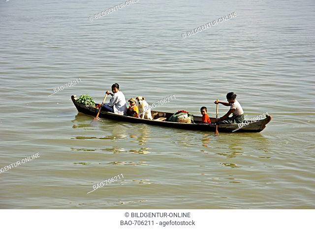 Boat with family on river Irrawaddy, Myanmar