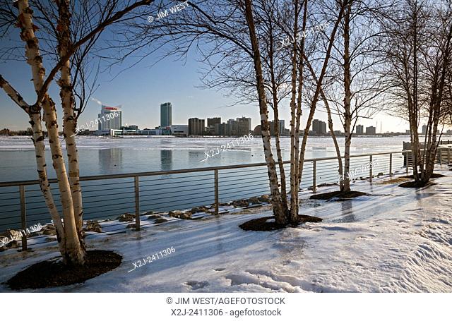Detroit, Michigan - The Detroit River in winter, photographed from the Detroit Riverwalk. Windsor, Ontario is across the river