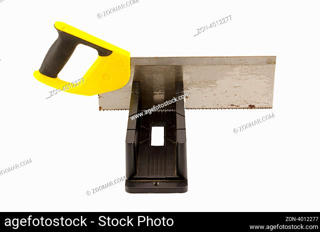 hand saw and angle cut miter box tool isolated on white background