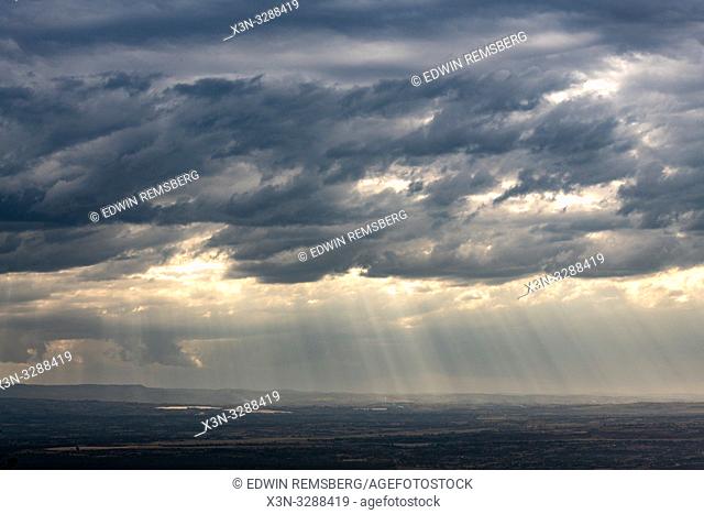The sun bursts through the clouds in Lake Nakuru National Park, Kenya