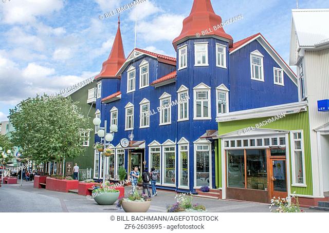 Iceland Akureyri downtown center second largest city walking street Hafnarstraeti Street with blue cafe building