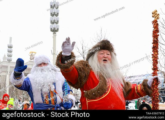 RUSSIA, MOSCOW - DECEMBER 10, 2023: Sook Irei (R), the Tuvan Father Frost, and Kodzyd Pol, the Komi Father Frost, attend a celebration of their birthdays during...