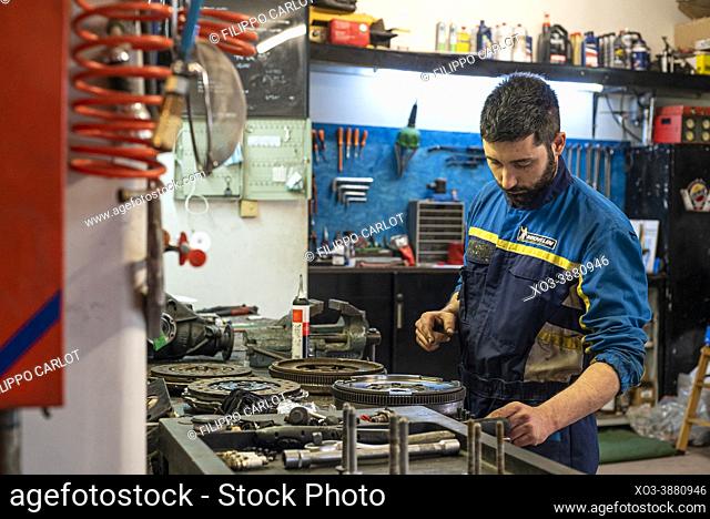 MILAN, ITALY: Mechanic at work in the workshop