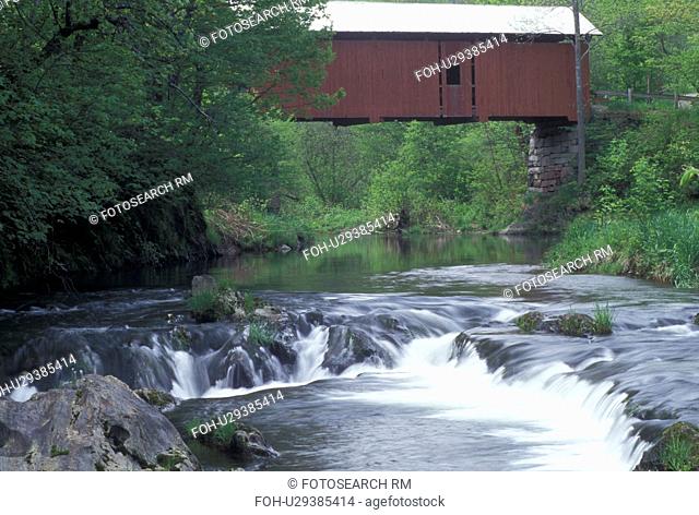 covered bridge, river, spring, Northfield Falls, VT, Vermont, Slaughter House Covered Bridge crosses over Dog River in the spring in Northfield Falls