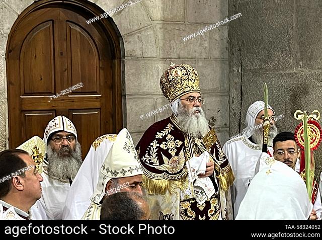 RUSSIA, JERUSALEM - APRIL 9, 2023: Clergymen attend a Palm Sunday service held at the Church of the Holy Sepulchre to mark Christ's triumphal entry into...