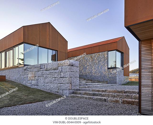 Assembly of three-building-complex with stone stairs. Smith Residence, Kingsburg, Canada. Architect: MacKay-Lyons Sweetapple, 2018