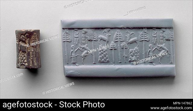 Cylinder seal and modern impression: hunting scene. Period: Akkadian; Date: ca. 2250-2150 B.C; Geography: Mesopotamia; Culture: Akkadian; Medium: Chert;...