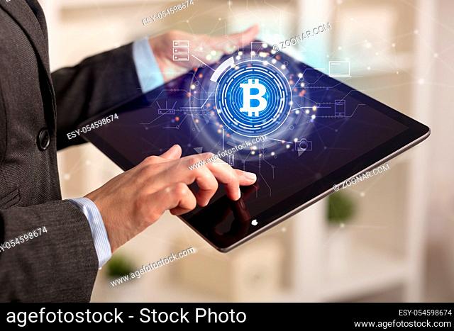 Business woman using tablet in home office mood with cryptocurrency bitcoin link network concept
