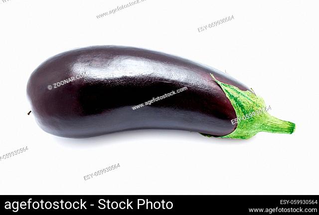 Ripe fresh aubergine or eggplant isolated on white background
