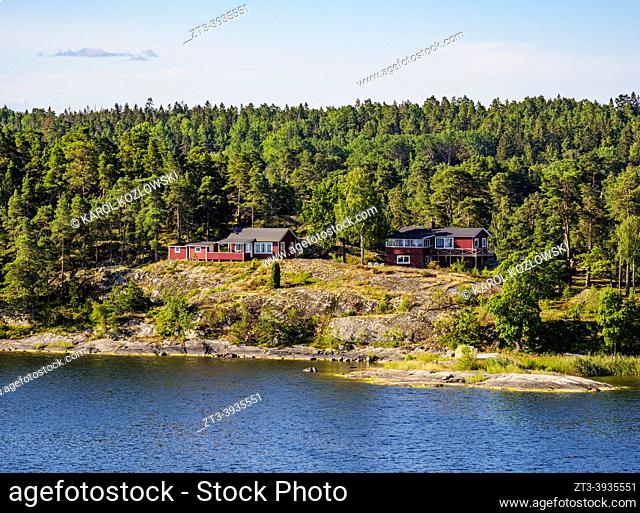 Houses on the shore of the waterway from Stockholm to the Baltic Sea, Stockholm County, Sweden