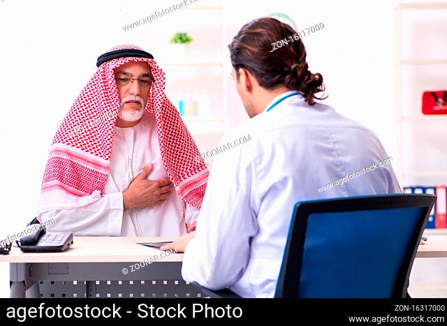 The old male arab visiting young male doctor