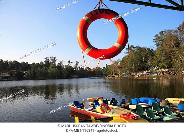 Life ring and boats near lake ; Hill Station Kodaikanal; Tamil Nadu; India