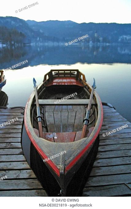 A boat sits still on Lake Bled, Slovenia
