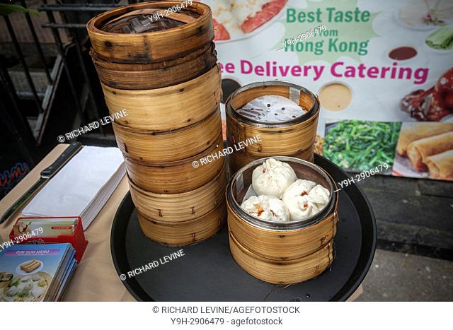 Dim Sum Palace serves steamed dumplings after the unveiling of the new wayfinding kiosks that stand at either end of Restaurant Row in New York